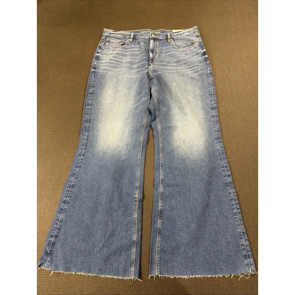 New American Eagle Dreamy Low-Rise Baggy Flare Simply Dark Raw Hem Jean 18 34W - Picture 1 of 9